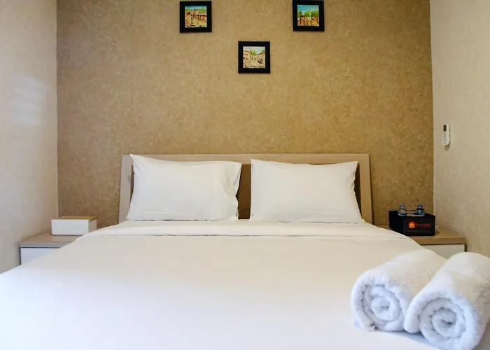 Minimalist And Comfy 1Br Grand Kamala Lagoon Apartment By Travelio